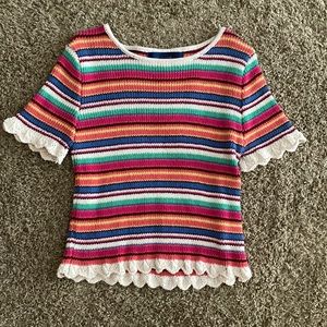 Blue Rain sweater shirt with trim on the sleeves and bottom of the shirt